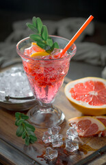 Glasses of wine on a black background.