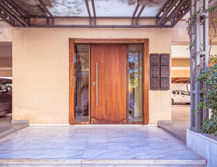 contemporary house front entrance solid wood and glass door
