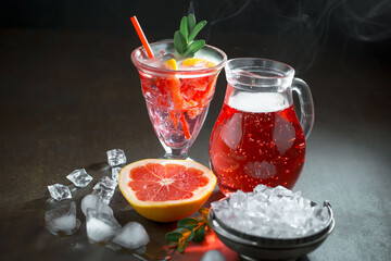 Refreshing summer alcoholic cocktail with crushed ice and citrus fruits