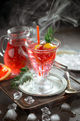 Refreshing summer alcoholic cocktail with crushed ice and citrus fruits