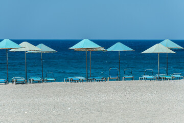 Triopetra Beach with a lot of big rocks and blue water, Crete island, Greece.