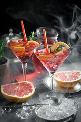 Glasses of wine on a black background.