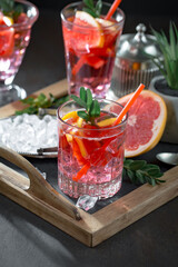 Glasses of wine on a black background.