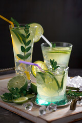Cocktail in a glass with fruit on an old background.
