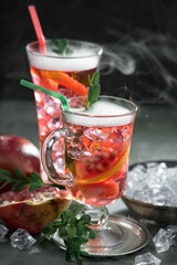 Refreshing summer alcoholic cocktail with crushed ice and citrus fruits