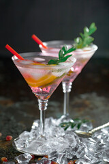 Glasses of wine on a black background.