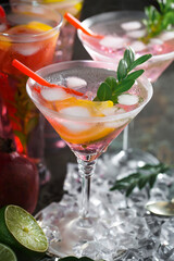 Glasses of wine on a black background.