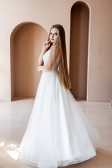 Fototapeta premium Beautiful bride in a wedding dress