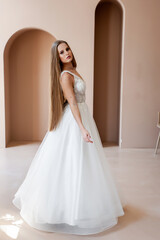 Fototapeta premium Beautiful bride in a wedding dress