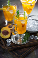 Refreshing summer alcoholic cocktail with crushed ice and citrus fruits