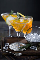 Fruit cocktail, in a glass with natural healthy fruits on a table with kitchen accessories.