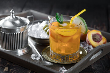 Refreshing summer alcoholic cocktail with crushed ice and citrus fruits
