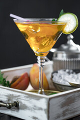 Refreshing summer alcoholic cocktail with crushed ice and citrus fruits