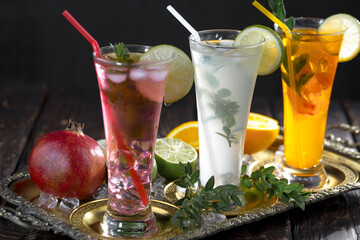 Glasses of wine on a black background.