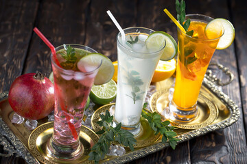 Glasses of wine on a black background.