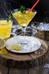 Refreshing summer alcoholic cocktail with crushed ice and citrus fruits