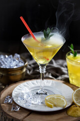 Refreshing summer alcoholic cocktail with crushed ice and citrus fruits