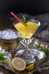 Fototapeta premium Refreshing summer alcoholic cocktail with crushed ice and citrus fruits