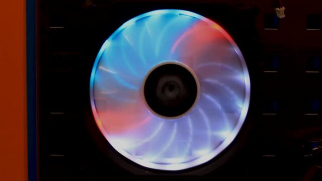 PC cooler glowing in different colors in the syste
