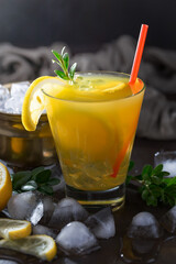 Refreshing summer alcoholic cocktail with crushed ice and citrus fruits