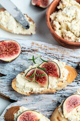 Sandwiches with ricotta cheese, figs, Delicious appetizer, ideal aperitif. top view