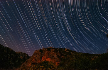 Western Star Trails Over Canyon