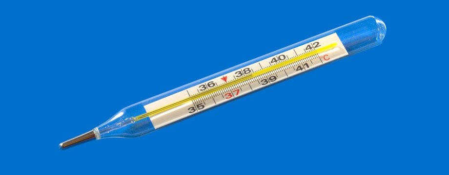 Mercury thermometer on a blue background. Temperature 38