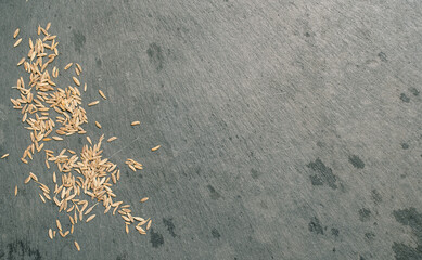 Cumin Seeds on Black Slate Tile