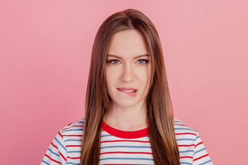 Photo of tempting hungry affectionate lady sensual expression bite lip on pink background