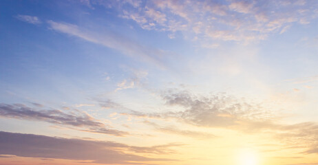 sunset sky with clouds in the morning with orange sunrise background 