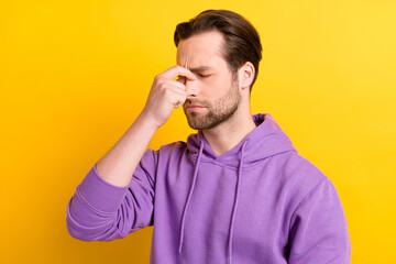 Profile side photo of young man hand touch nose bridge pain suffer unwell isolated over yellow color background