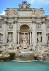 Obraz na płótnie Canvas ITALY- Rome, the Trevi Fountain represents Ocean on a chariot pulled by sea horses and tritons. ... The sculptor Nicola Salvi was chosen who began the work in 1732