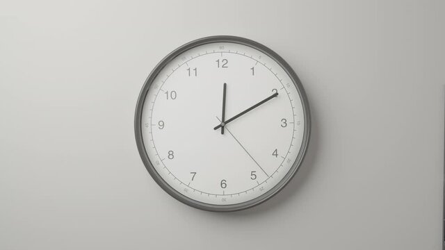 Clock Face on Dark White Office Wall in Timelapse