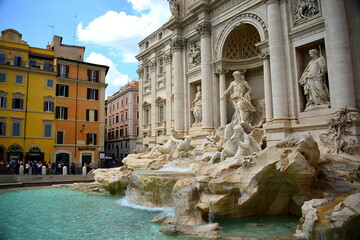 Naklejka na ściany i meble ITALY- Rome, the Trevi Fountain represents Ocean on a chariot pulled by sea horses and tritons. ... The sculptor Nicola Salvi was chosen who began the work in 1732
