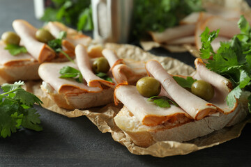 Delicious bruschetta snacks on dark wooden background