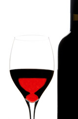 Italian red wine glass of wine supertuscan Sassicaia Ornellaia Barolo stylized glass in backlight whit bottle on white background