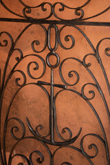 iron gate with cross