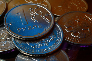 Russian 1 ruble coin is highlighted in blue. close-up.