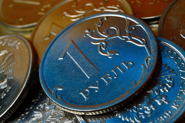 Russian 1 ruble coin is highlighted in blue. close-up.