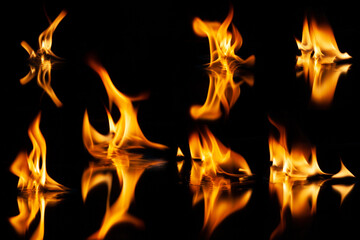 fire flame with reflection in the glass on a black background