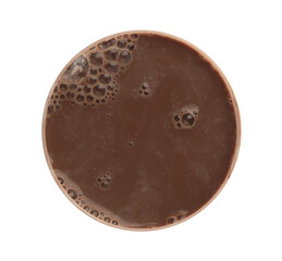 Delicious chocolate milk in glass isolated on white, top view