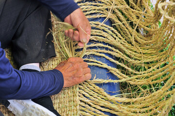 Korean twist rice of straw into a rope and straw shoes