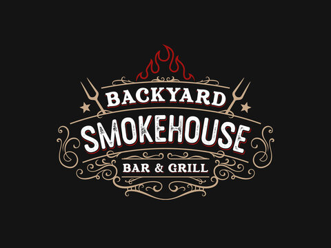 Vintage smokehouse bbq barbecue barbeque bar and grill logo design with fork and fire