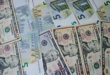 dollar and euro bills. lots of banknotes