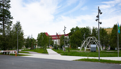 Naklejka premium Stone Walking Path in the Geologists ' Square in the city of Noyabrsk in summer