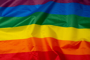 Rainbow flag as a background. Top view.