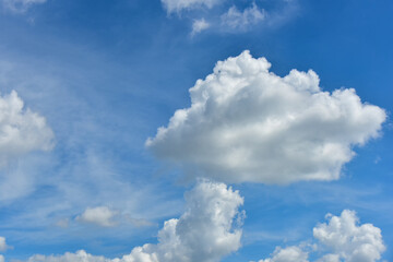 Fototapeta premium Beautiful white clouds on blue sky background.