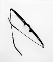 black glasses on a white background. simple and classic glasses for daily fashion style. elegant frame model for woman.