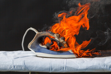 Iron in flames of fire, faulty wiring, cause of fire