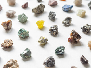 Colorful various uncut and raw mineral stones, gemstone and healing stone collection of various colors and shapes